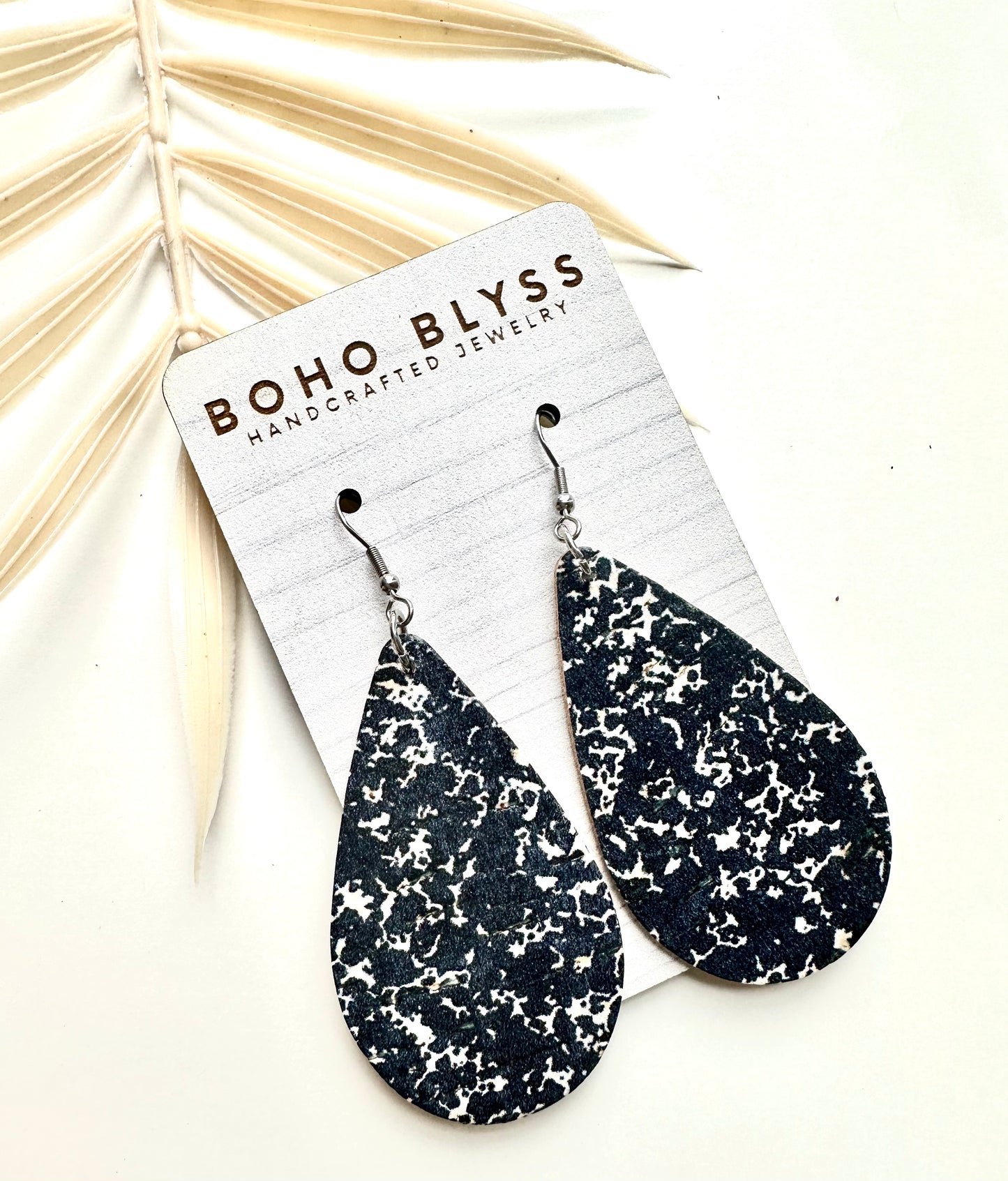 Black and white notebook teardrops