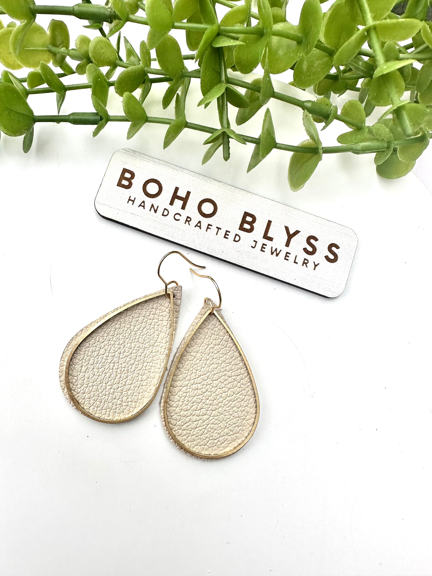 Bone and brass teardrops