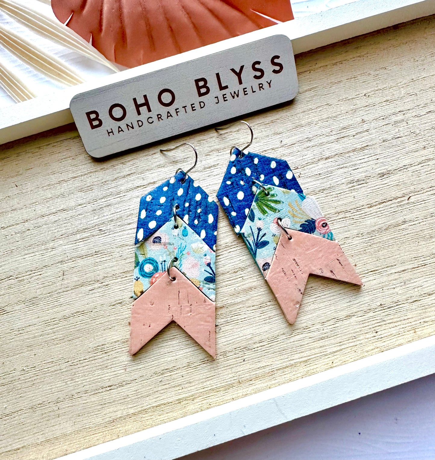 Blue and peach floral arrows