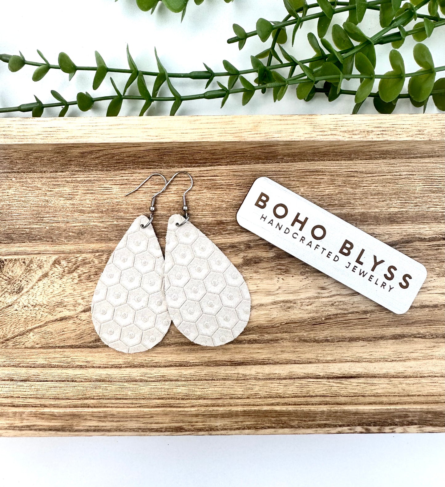 Cream hex teardrops