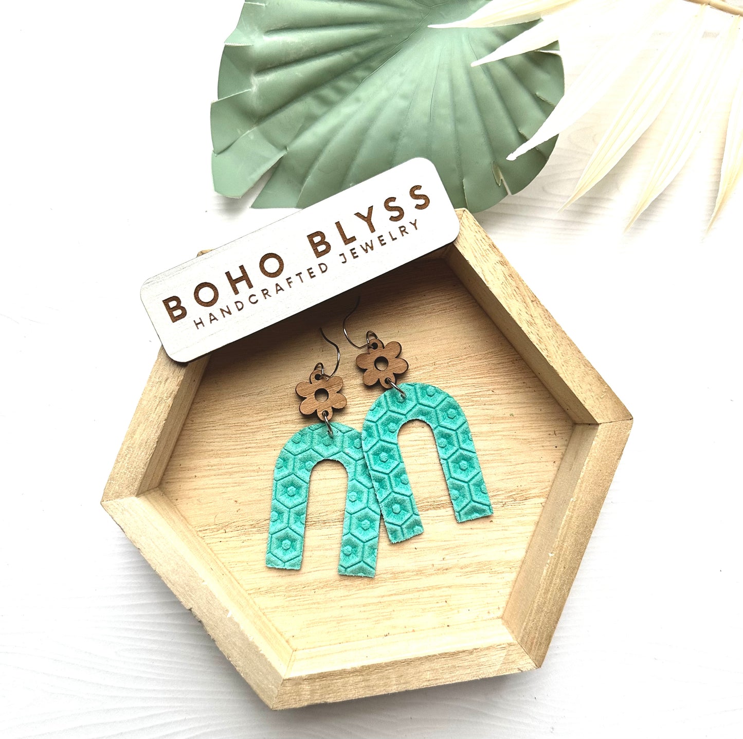 Teal hex arches and wood flowers