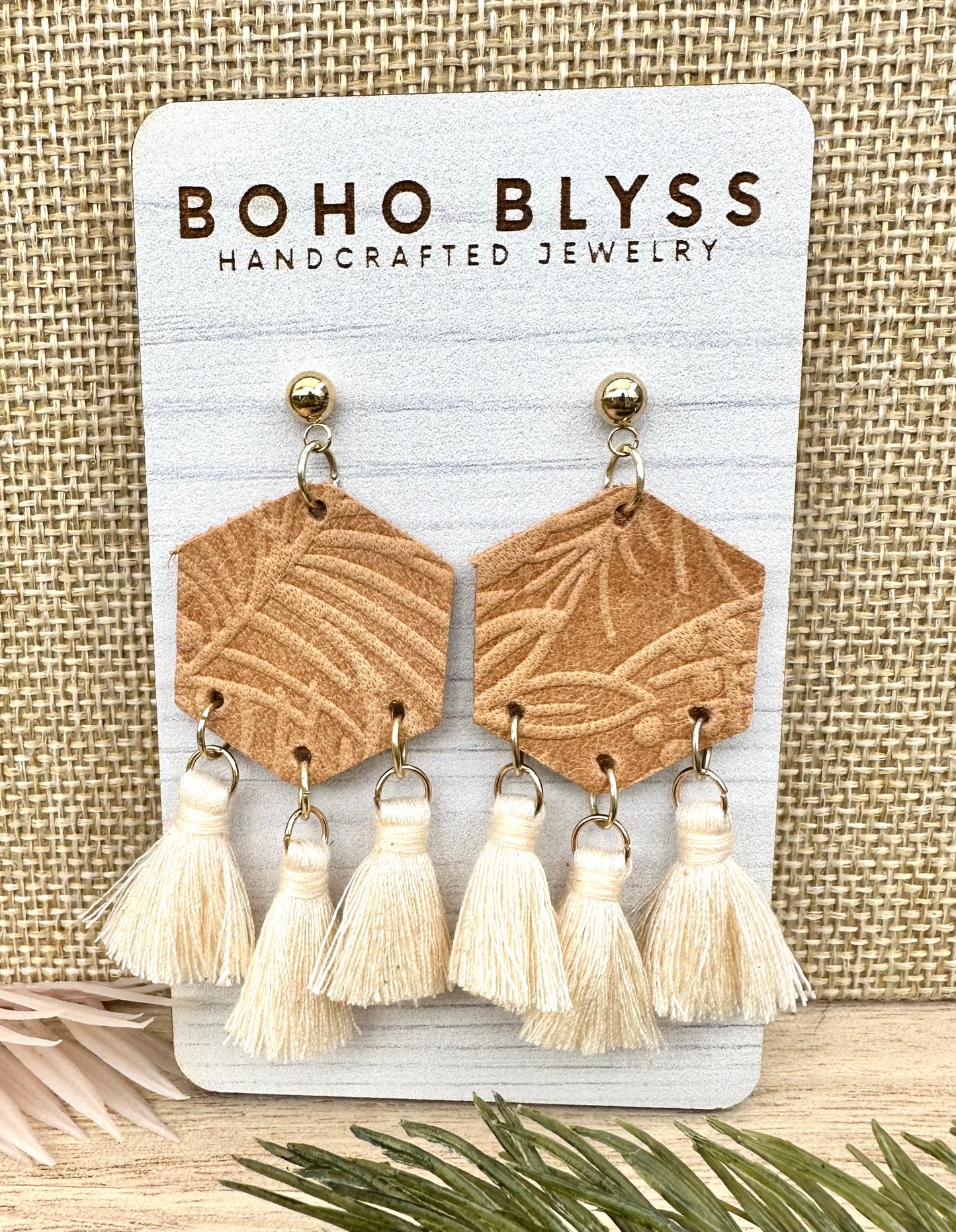 Embossed floral hexagons with tassels