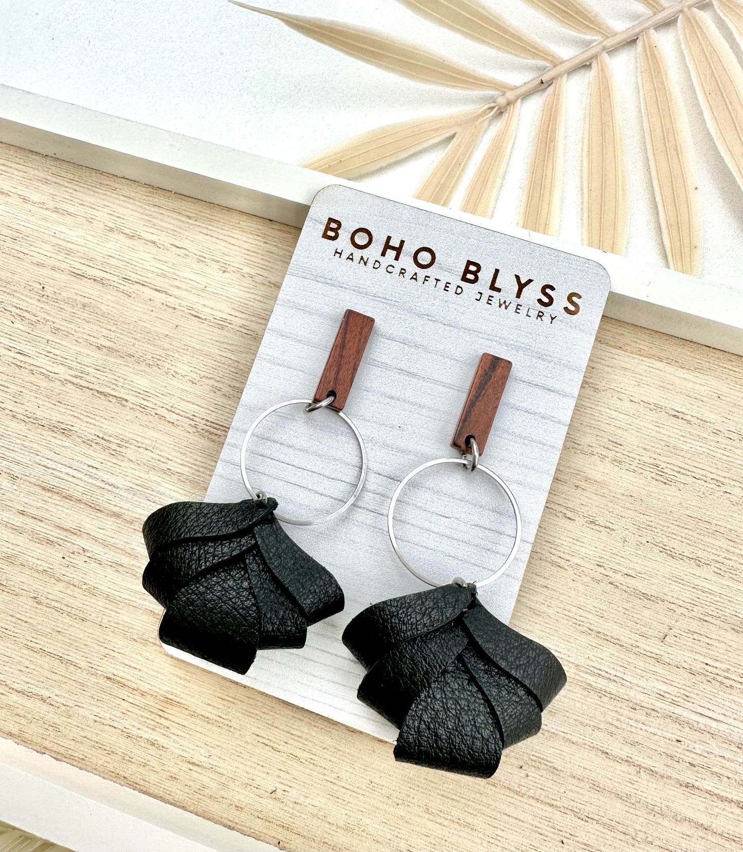 Black wraps on wooden posts