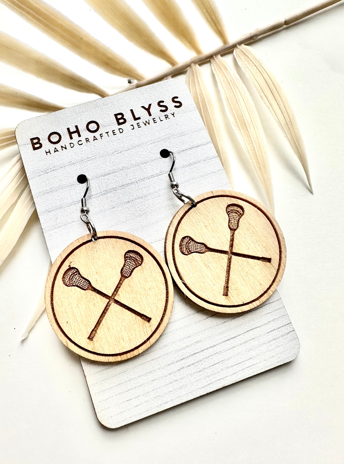 Wooden lacrosse dangles