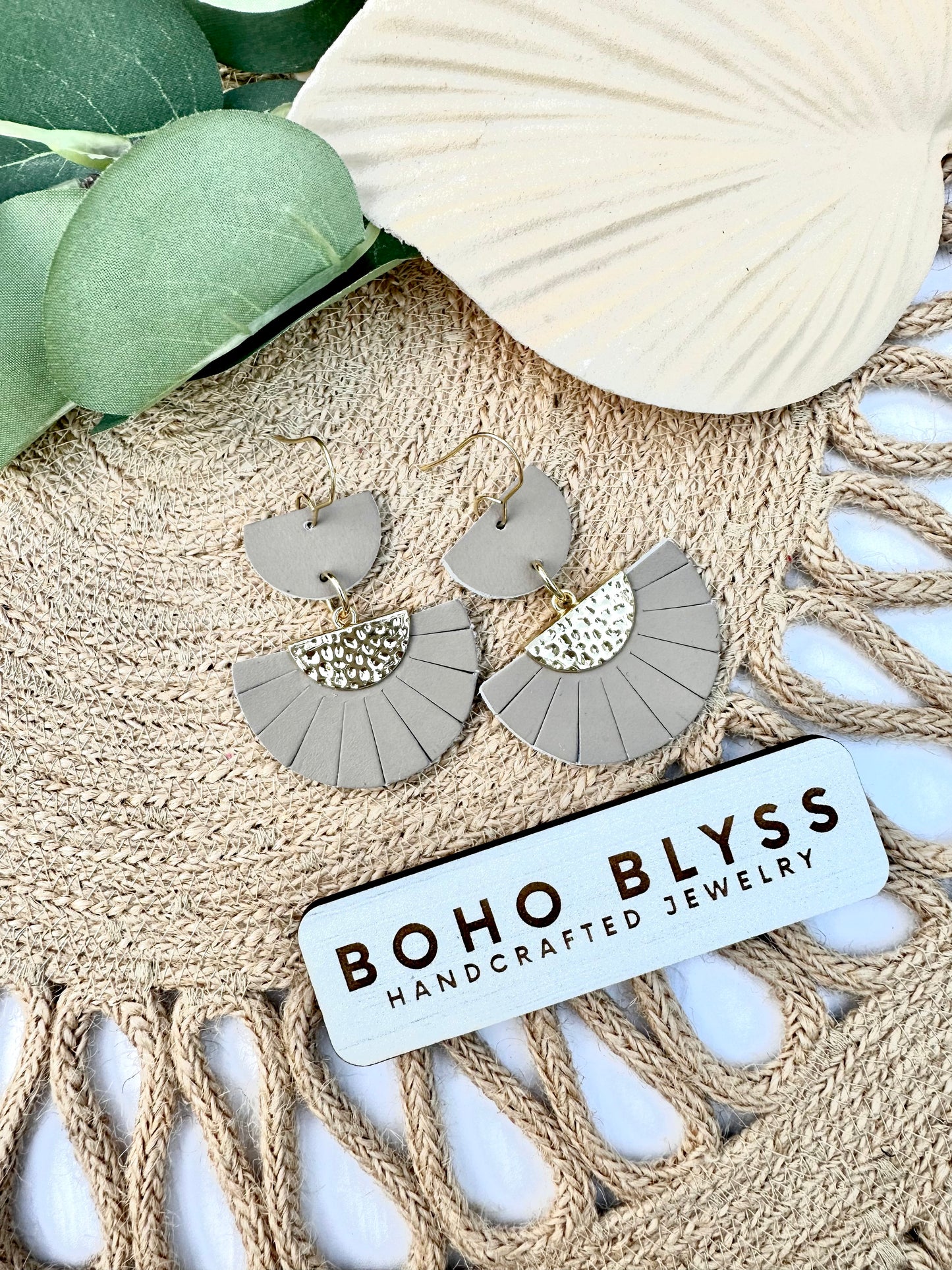 Taupe fanned fringe