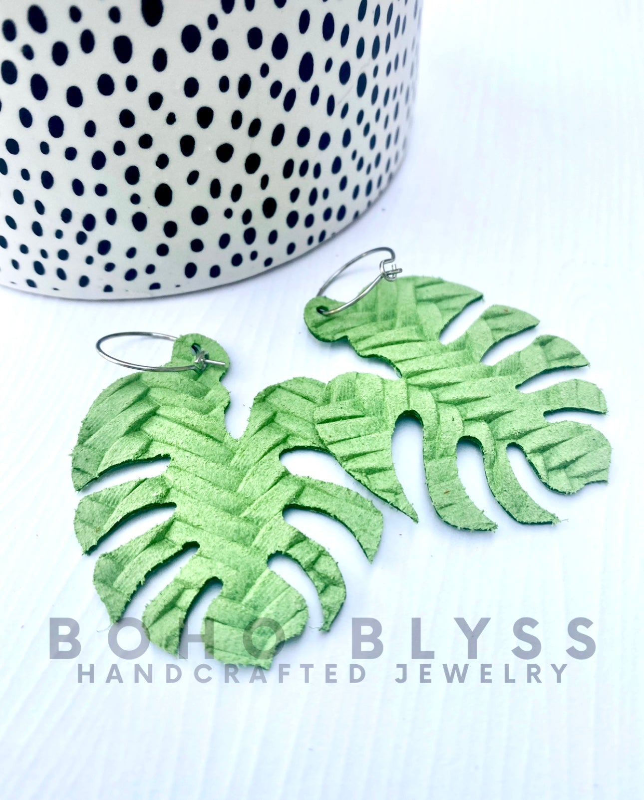 Spring green monstera leaves